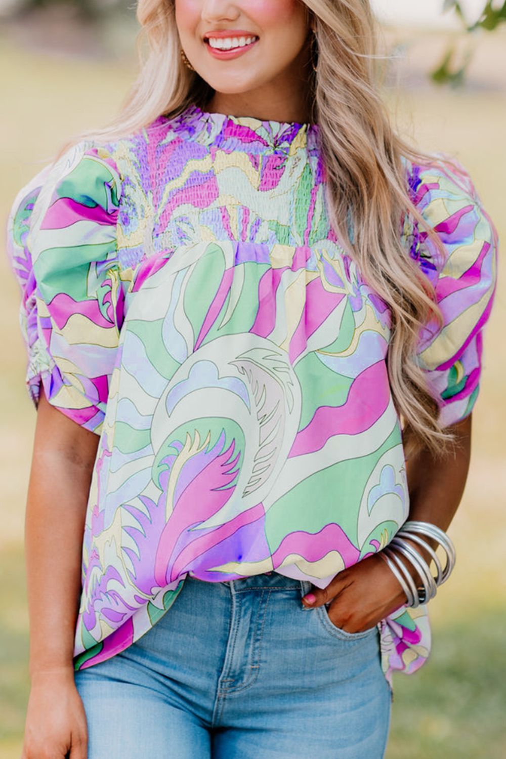 Smocked Round Neck Short Sleeve Blouse.