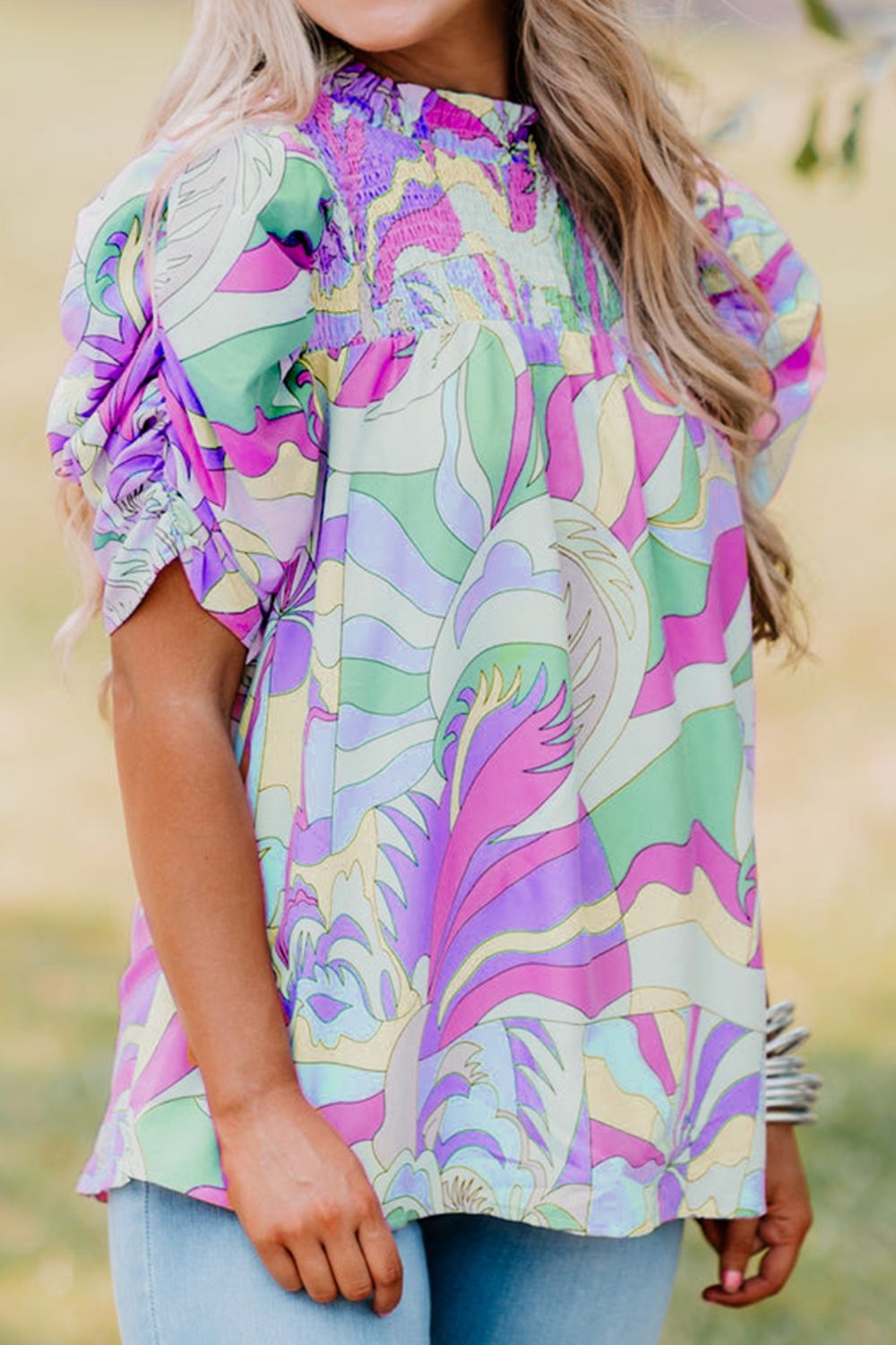 Smocked Round Neck Short Sleeve Blouse.