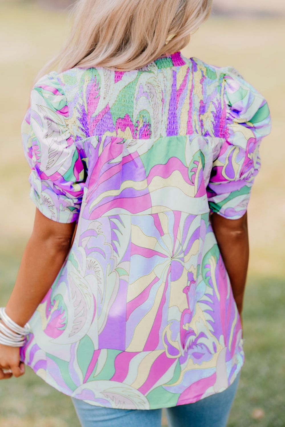 Smocked Round Neck Short Sleeve Blouse.