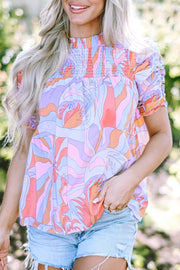 Smocked Round Neck Short Sleeve Blouse.