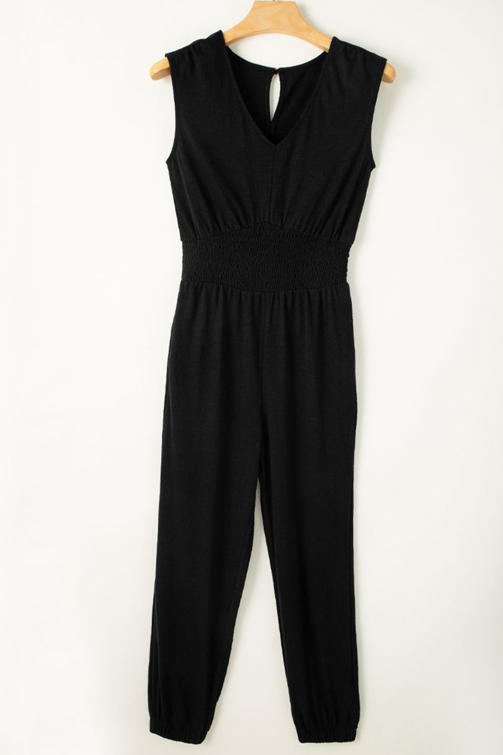 Smocked Sleeveless V Neck Jumpsuit with Pockets.