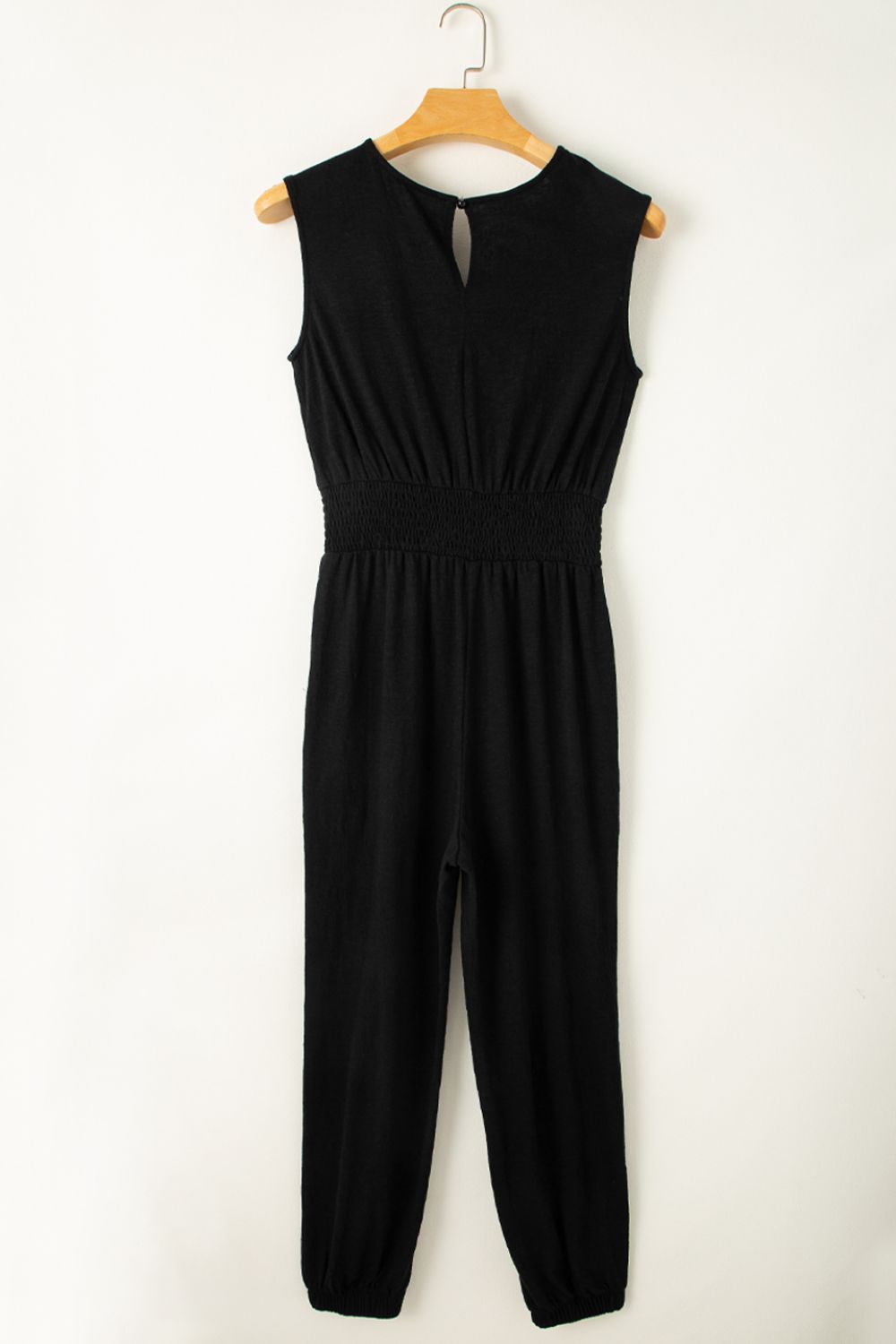 Smocked Sleeveless V Neck Jumpsuit with Pockets.