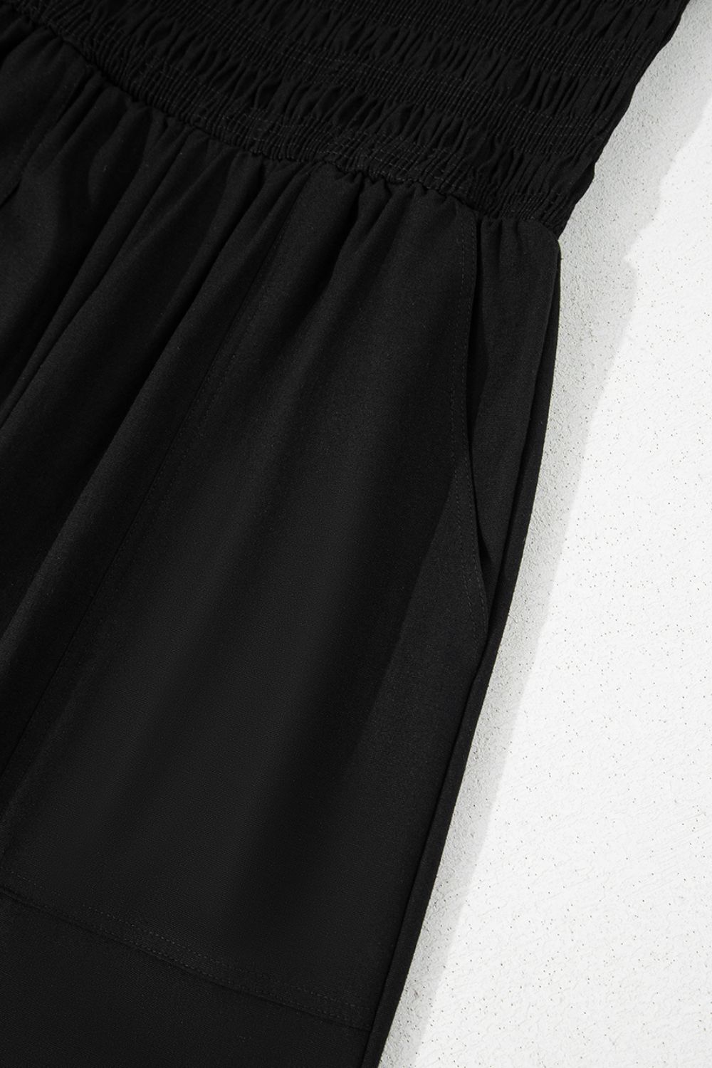 Smocked Spaghetti Straps Wide Leg Jumpsuit.