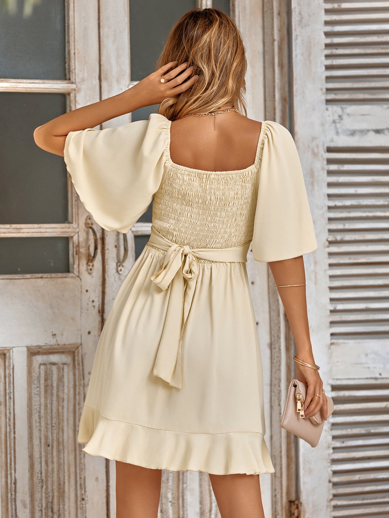 Smocked Tie Back Ruffle Hem Dress.