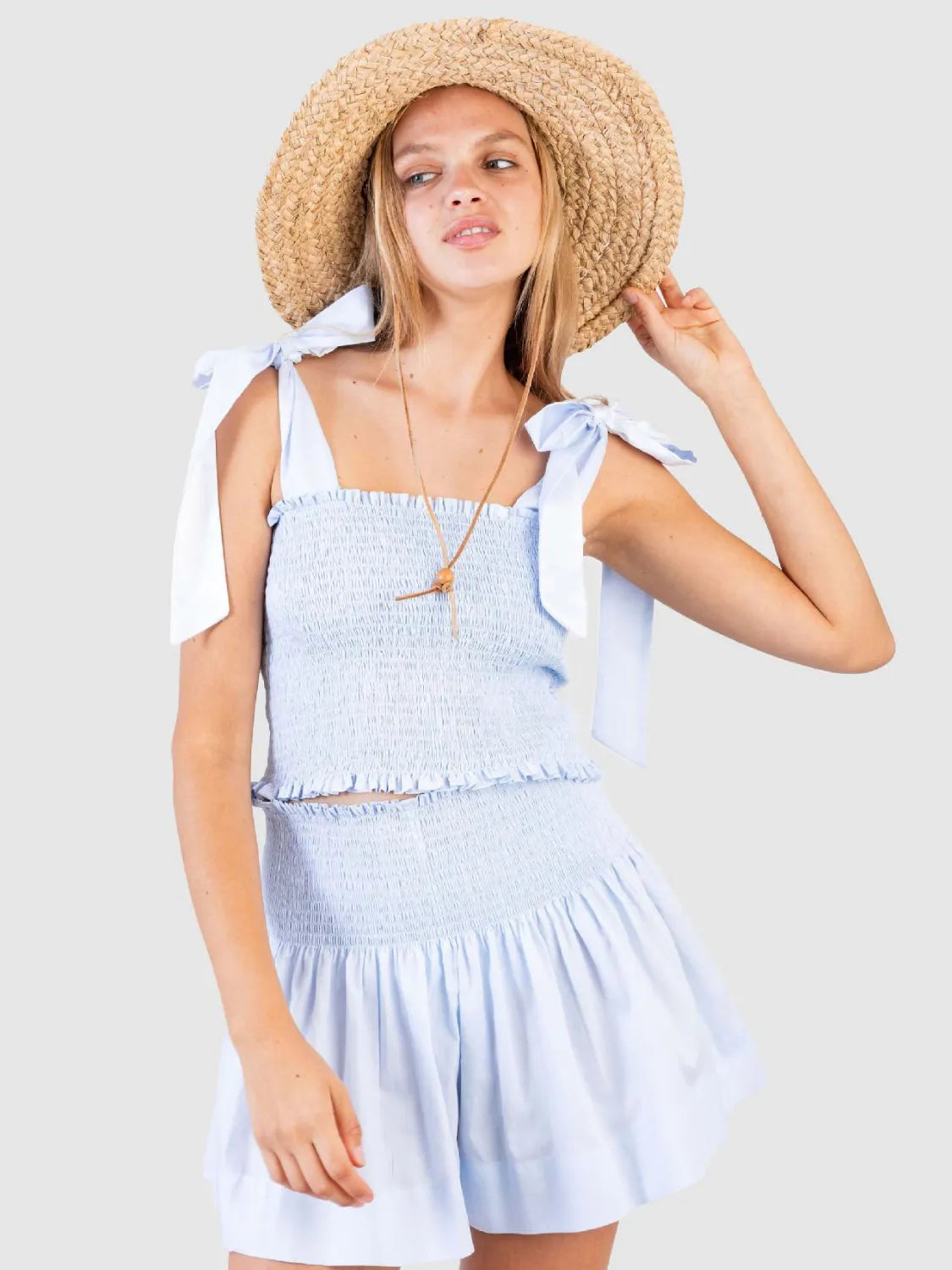 Smocked Tie Shoulder Top and Mini Skirt Set.