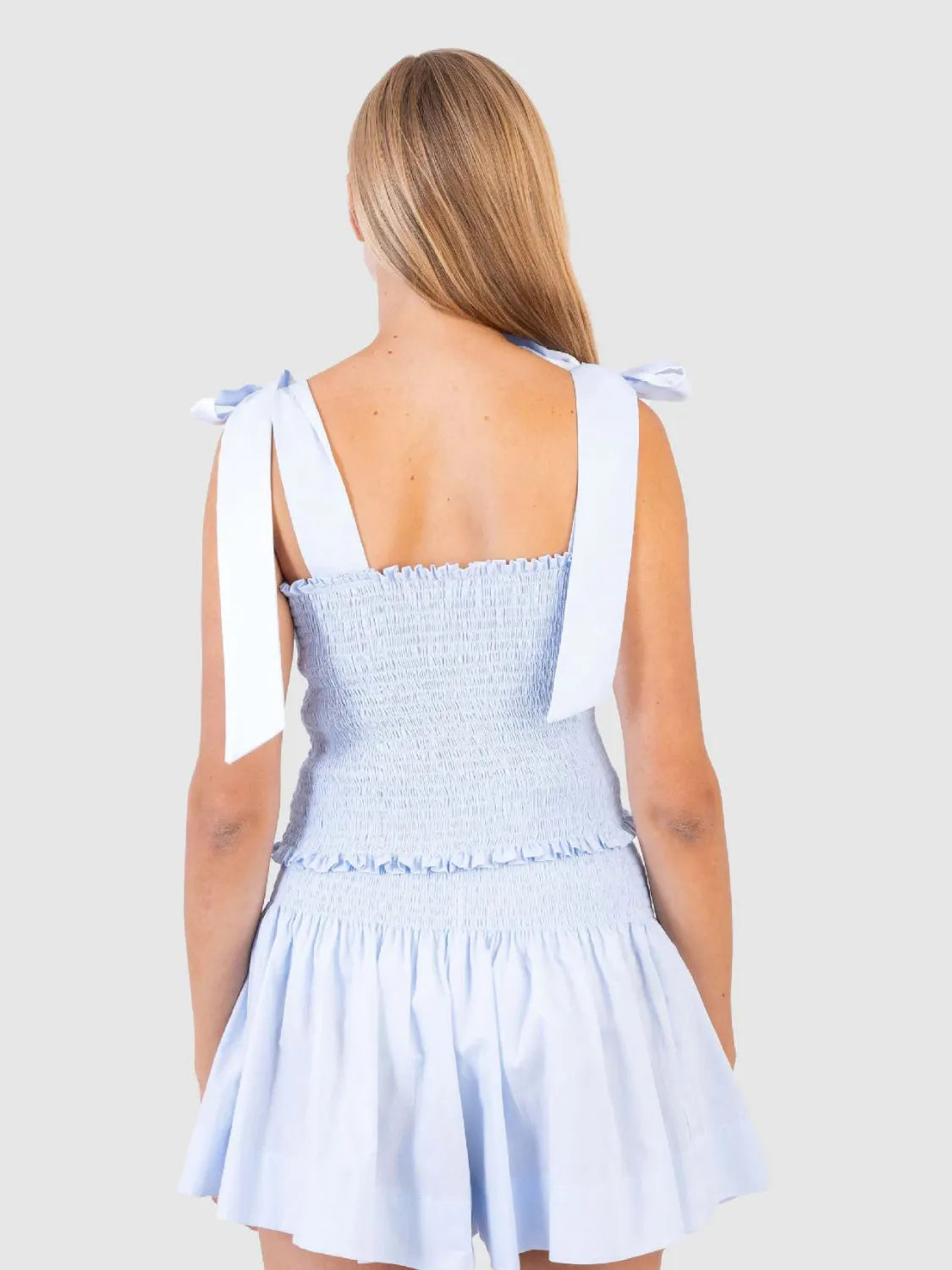 Smocked Tie Shoulder Top and Mini Skirt Set.