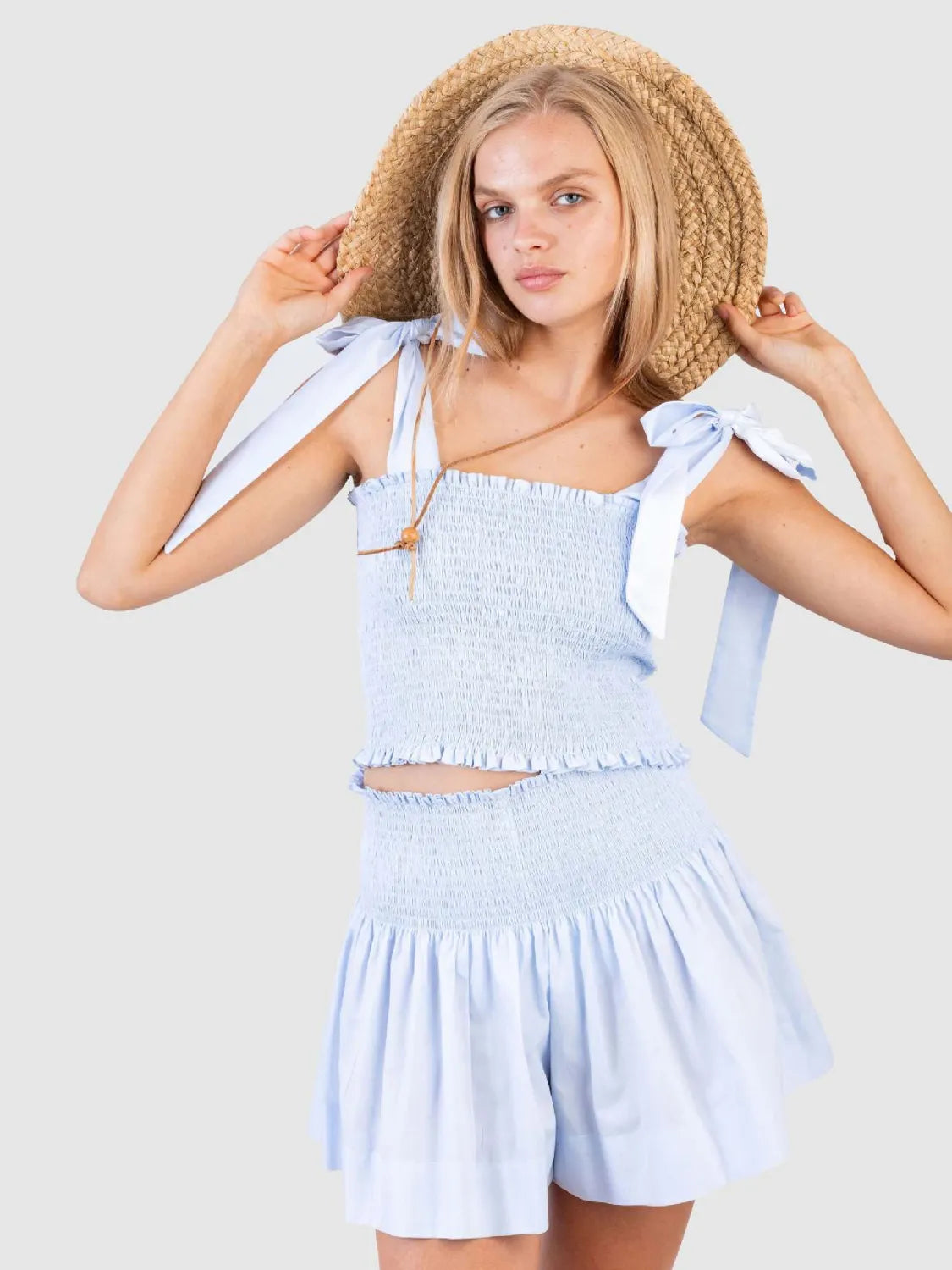 Smocked Tie Shoulder Top and Mini Skirt Set.