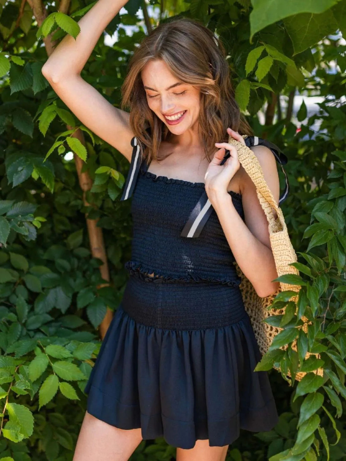 Smocked Tie Shoulder Top and Mini Skirt Set.