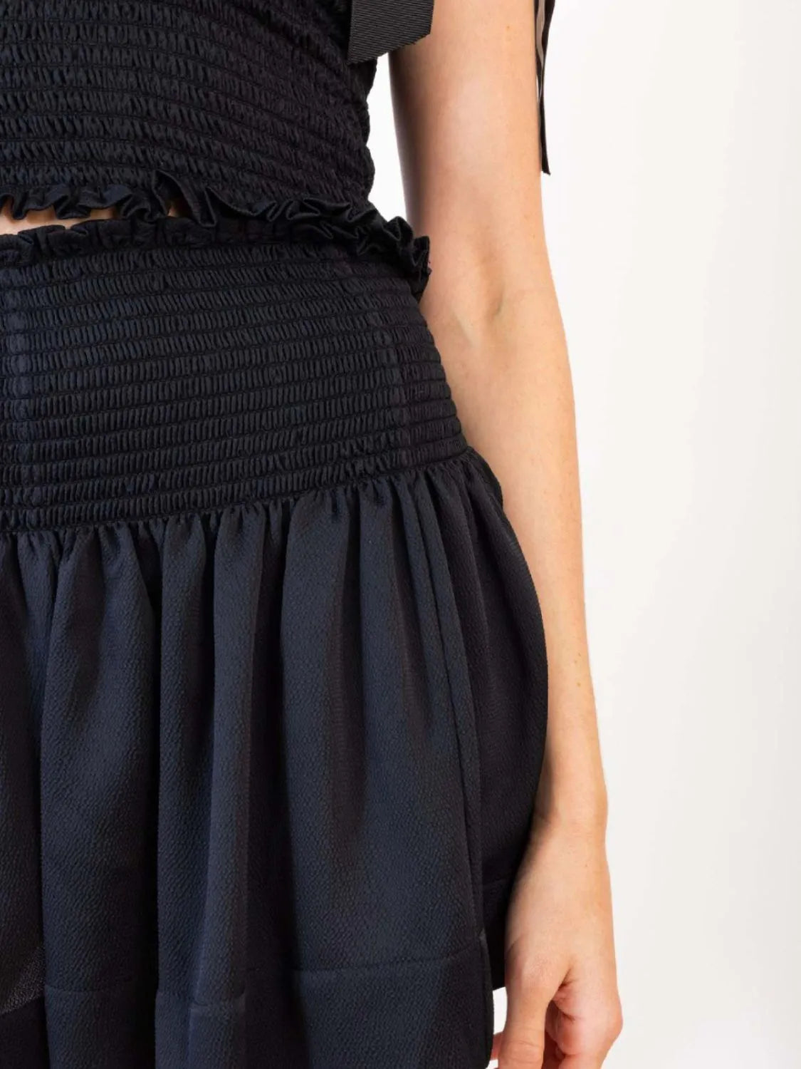 Smocked Tie Shoulder Top and Mini Skirt Set.