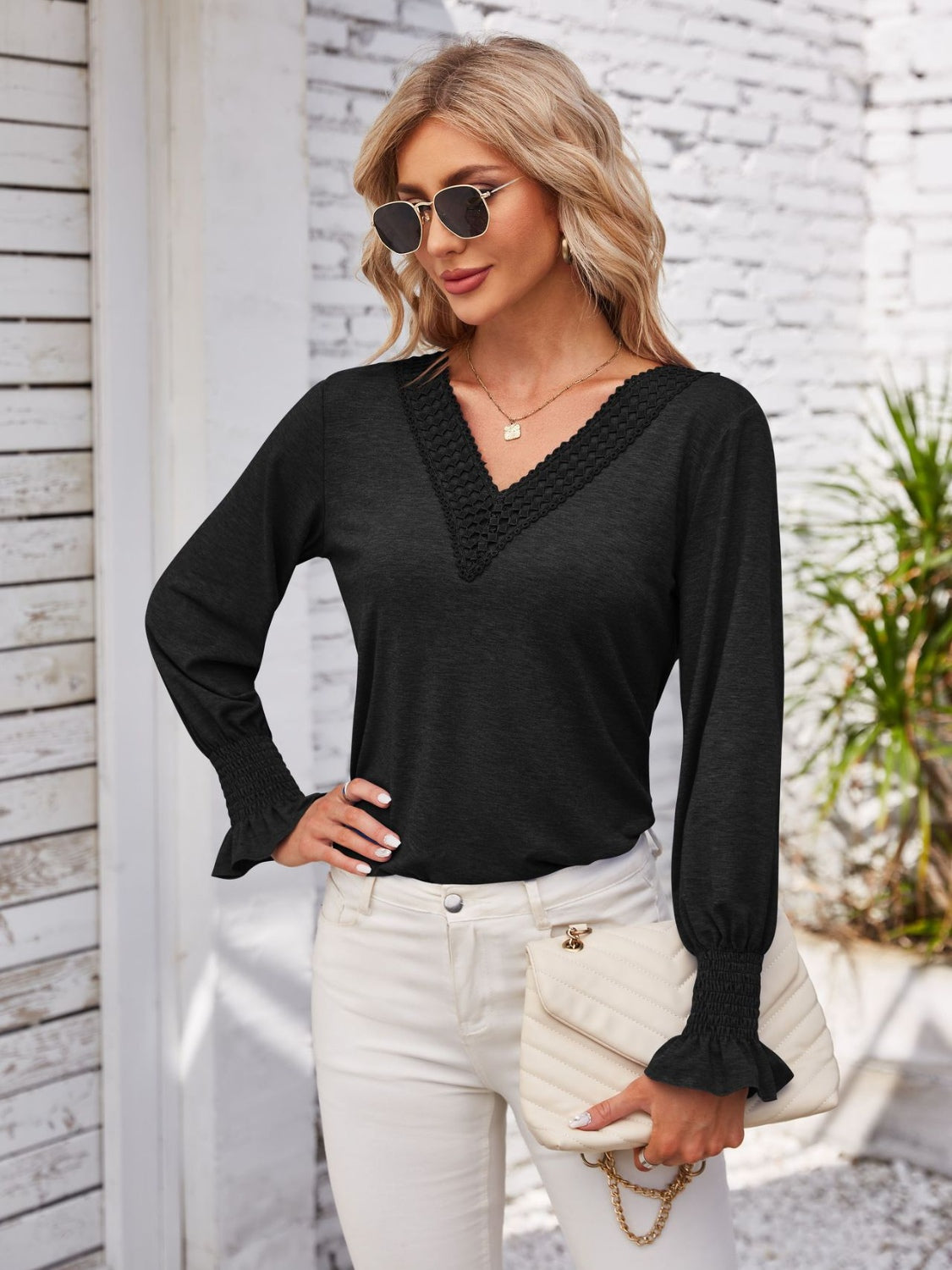 Smocked V-Neck Long Sleeve Blouse.
