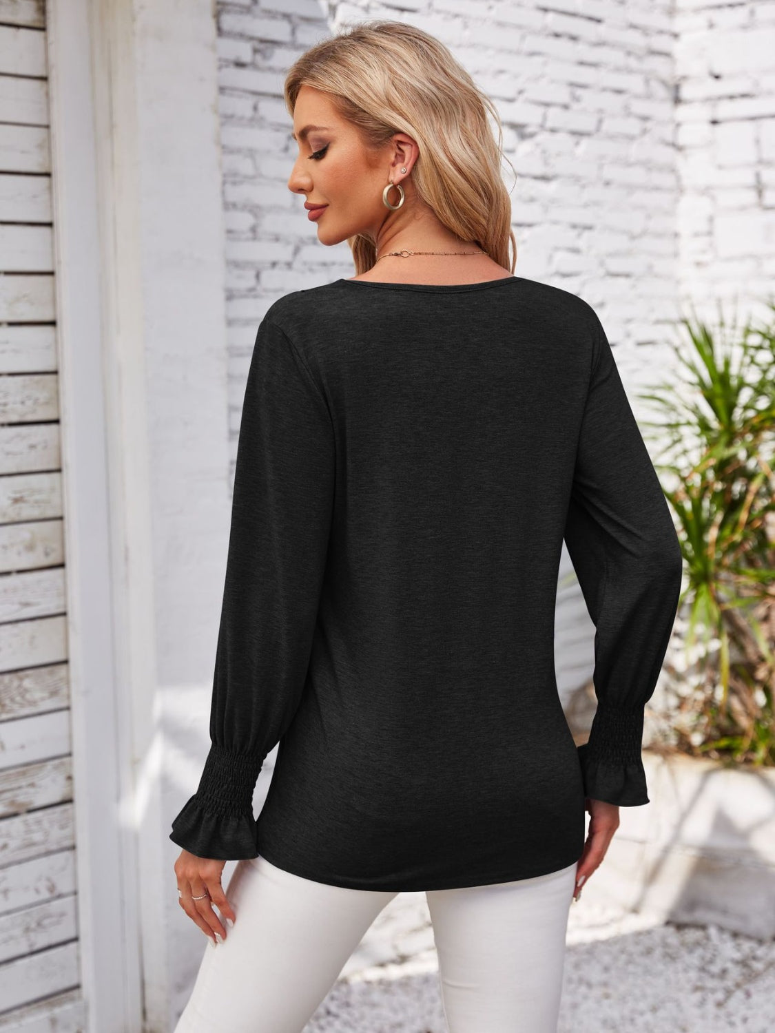 Smocked V-Neck Long Sleeve Blouse.
