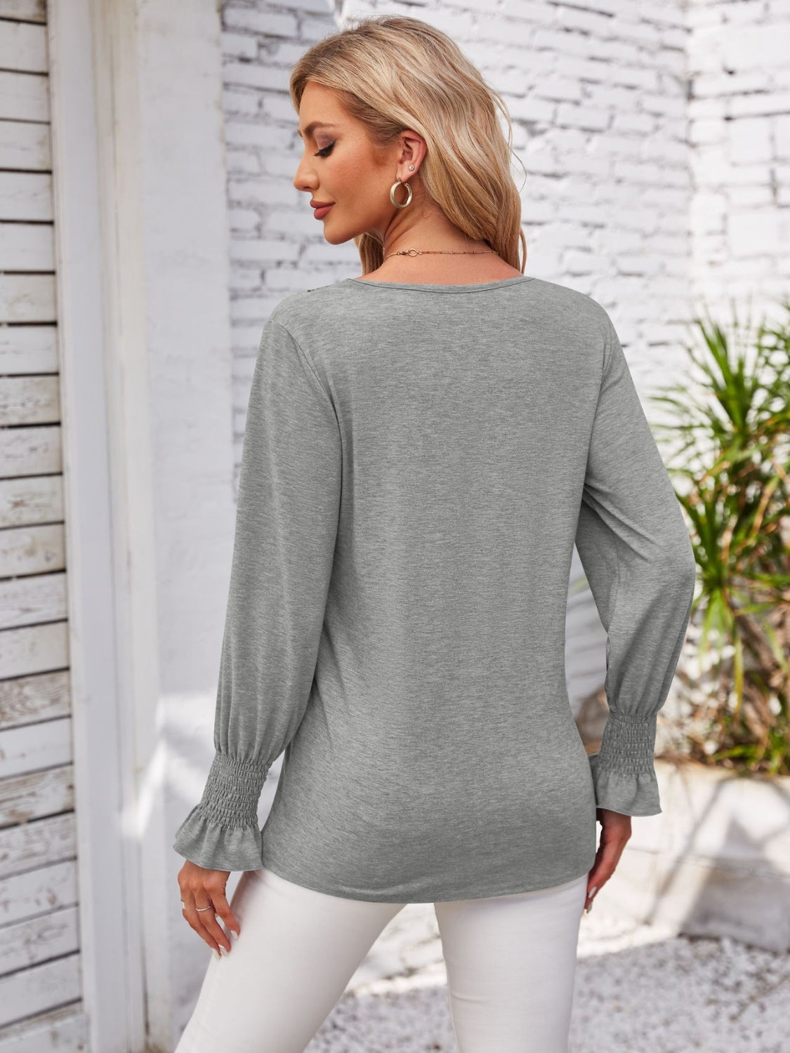 Smocked V-Neck Long Sleeve Blouse.