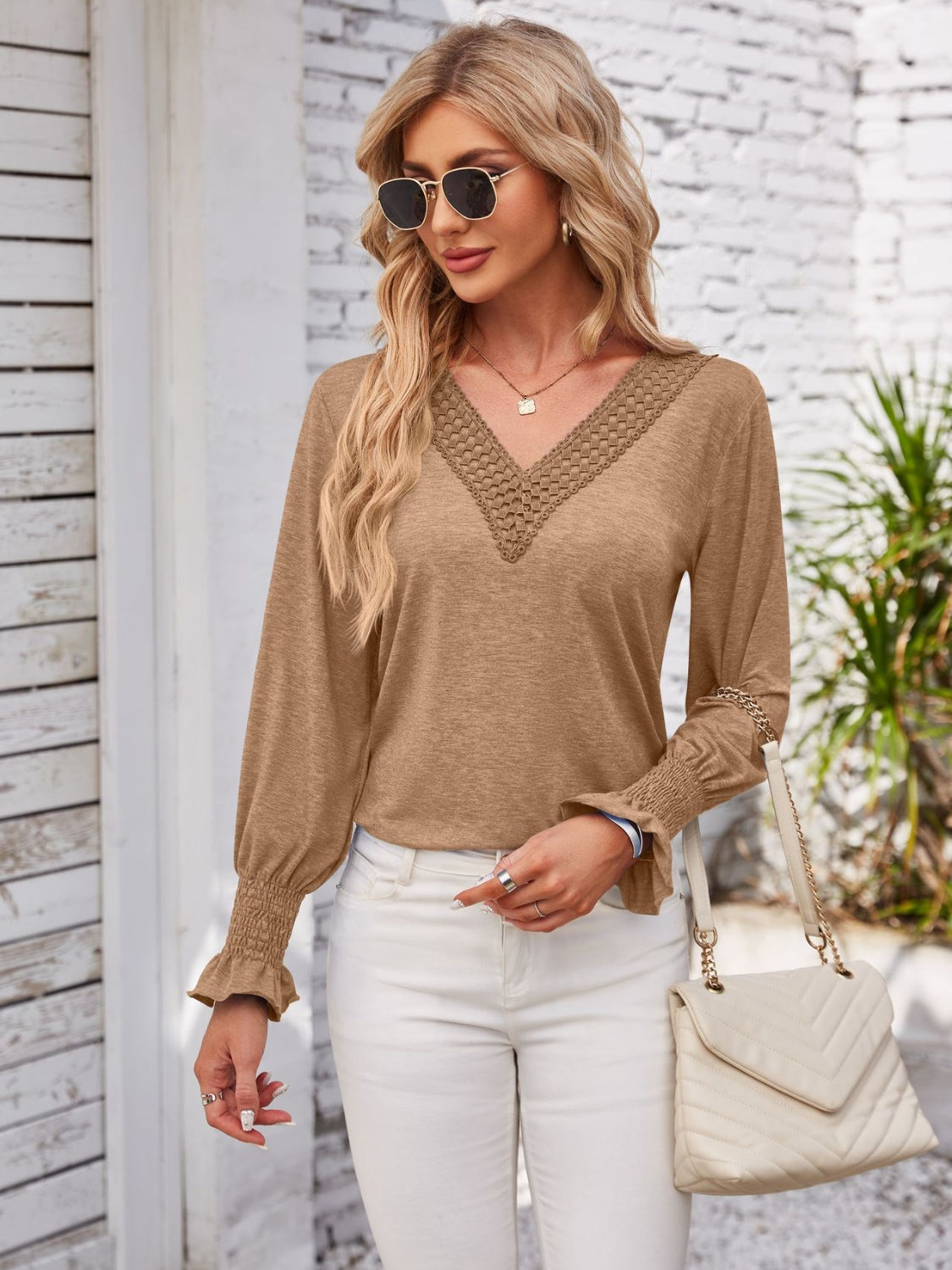 Smocked V-Neck Long Sleeve Blouse.