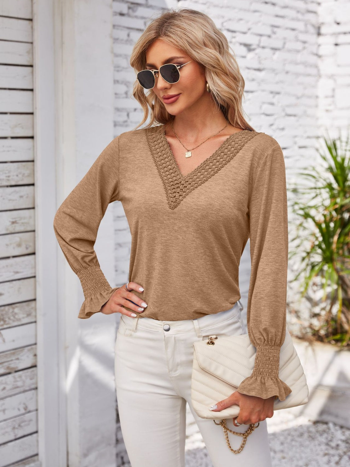 Smocked V-Neck Long Sleeve Blouse.