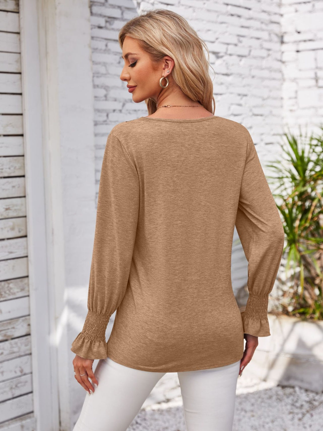 Smocked V-Neck Long Sleeve Blouse.