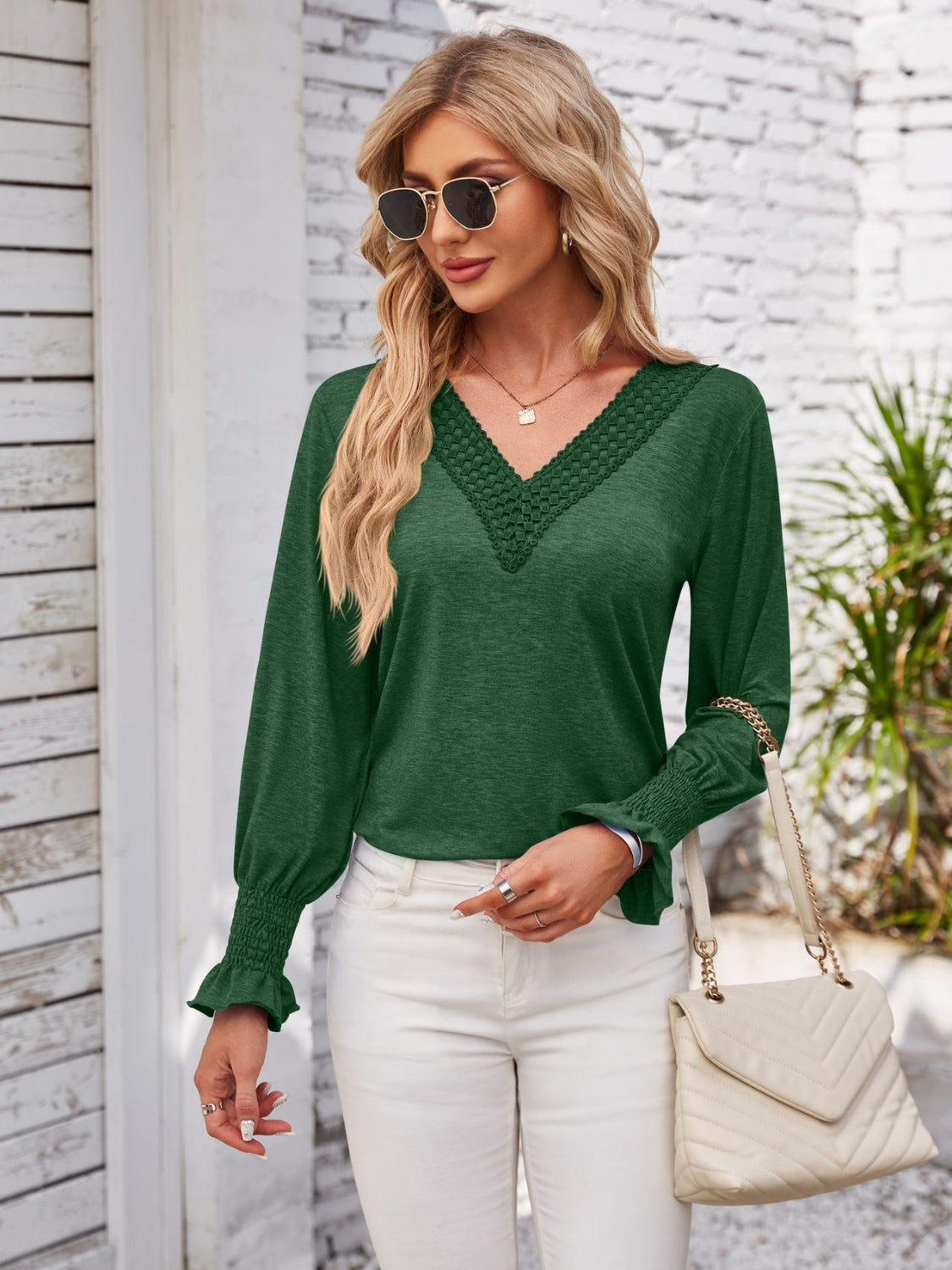 Smocked V-Neck Long Sleeve Blouse.
