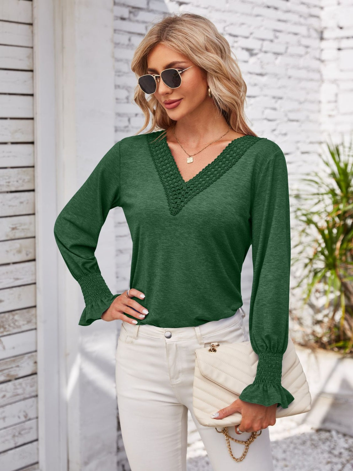 Smocked V-Neck Long Sleeve Blouse.