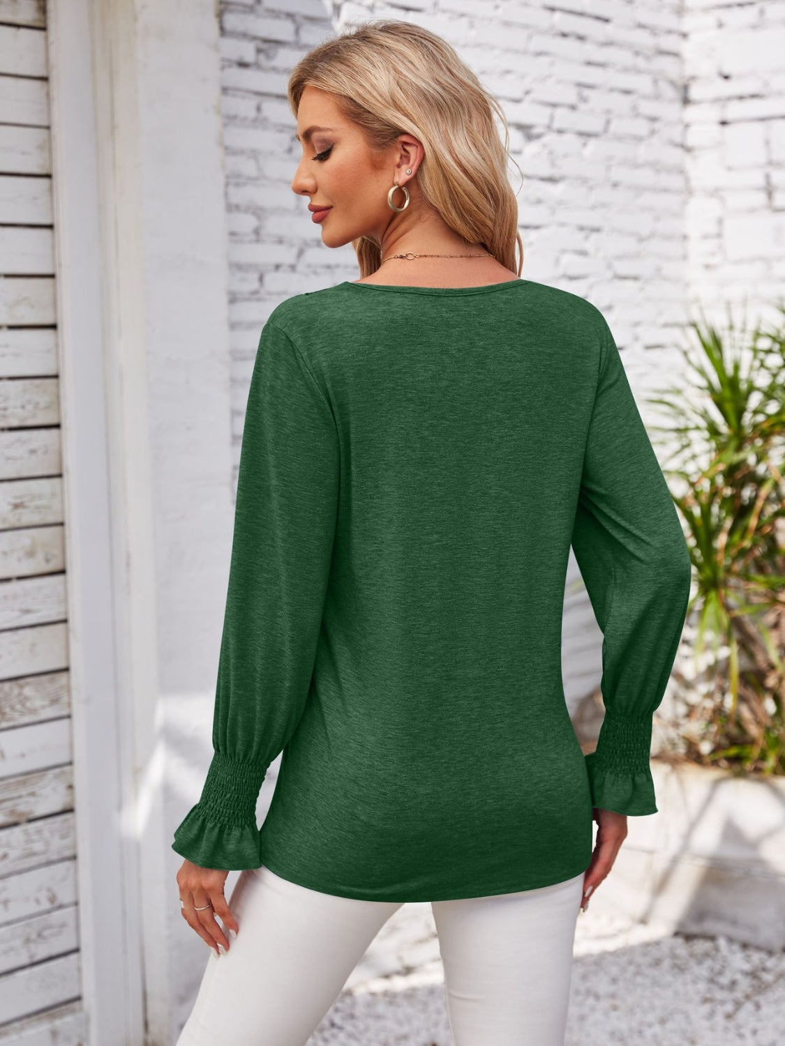 Smocked V-Neck Long Sleeve Blouse.