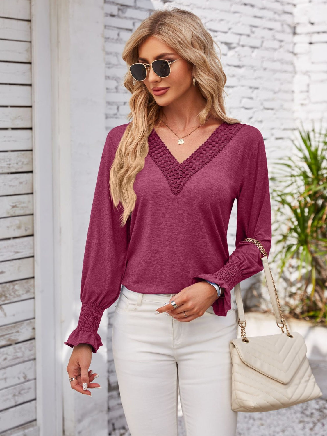 Smocked V-Neck Long Sleeve Blouse.