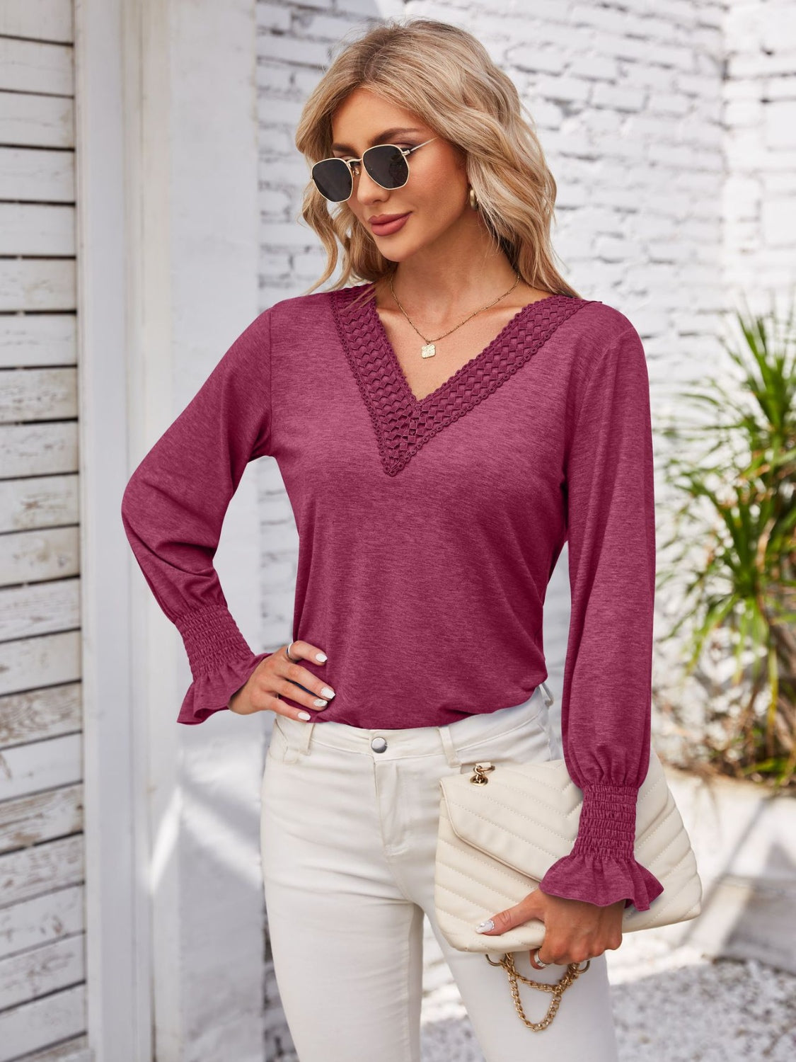 Smocked V-Neck Long Sleeve Blouse.