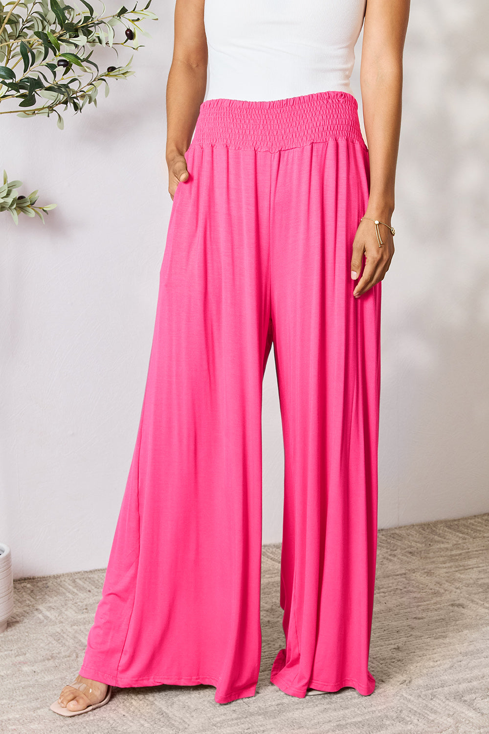 Smocked wide waistband wide leg pants, opaque.