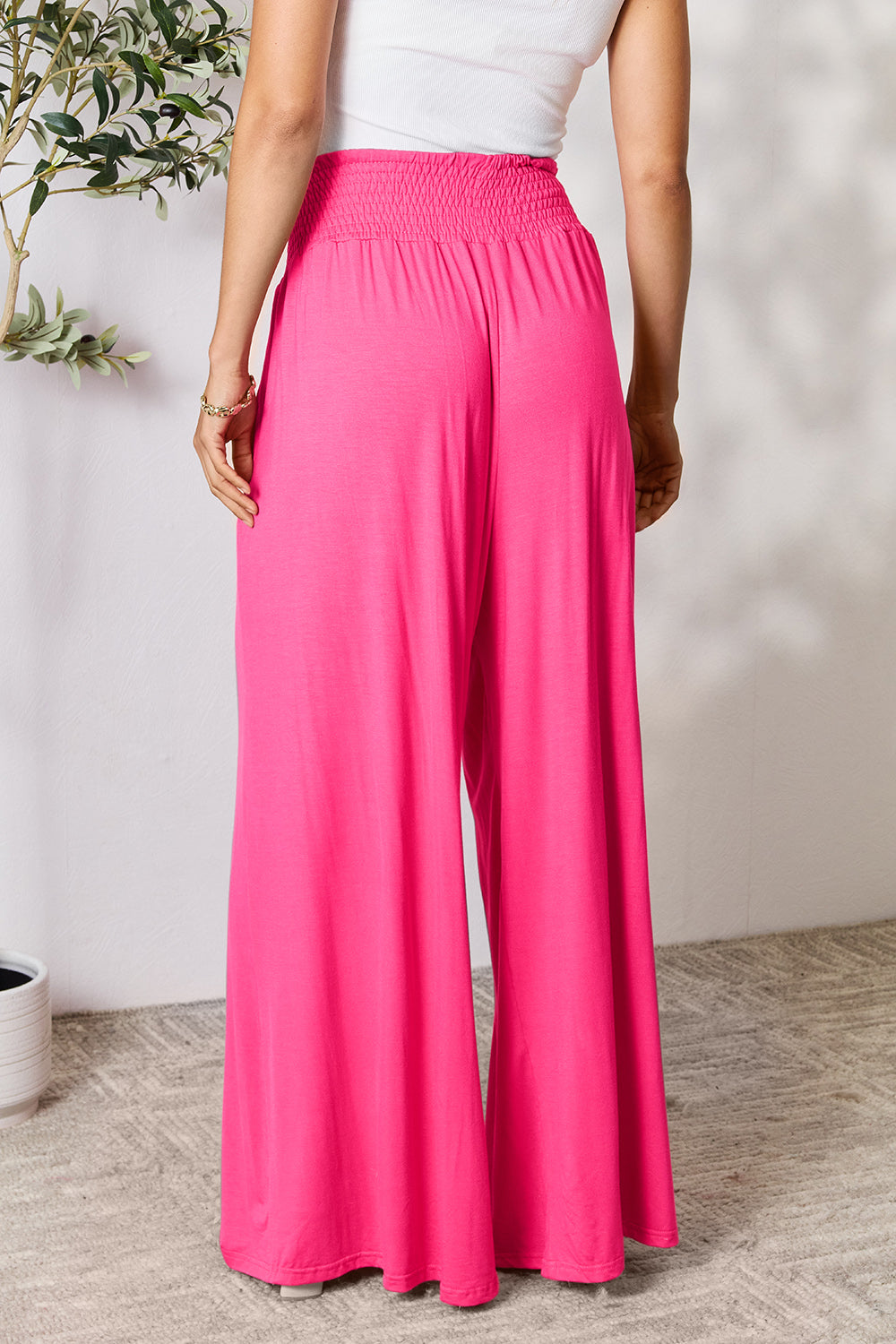 Smocked wide waistband wide leg pants, opaque.