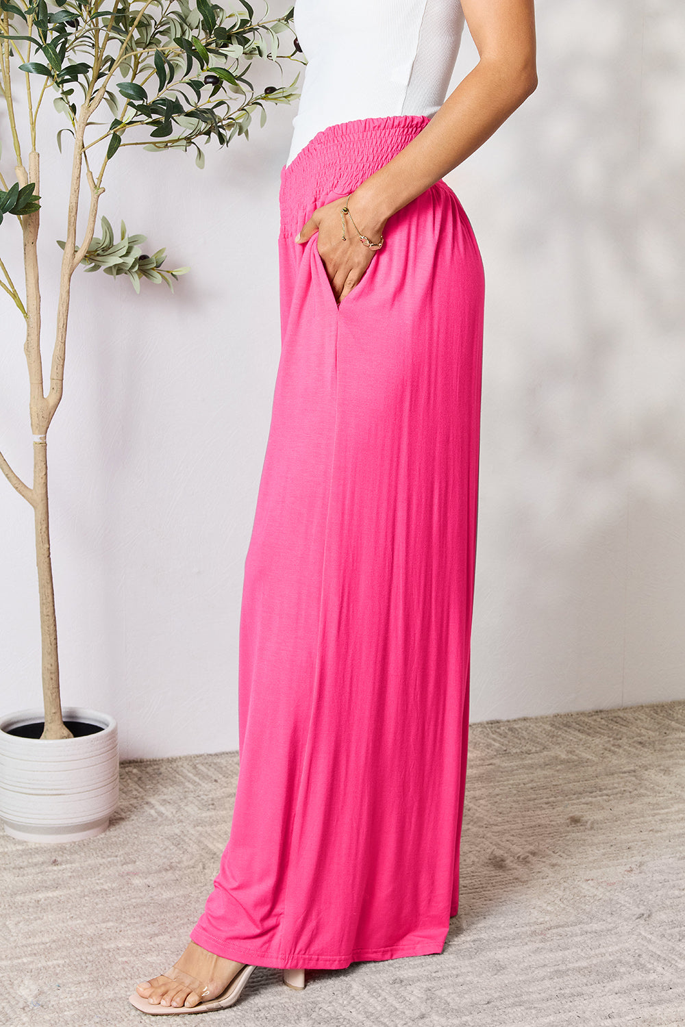 Smocked wide waistband wide leg pants, opaque.