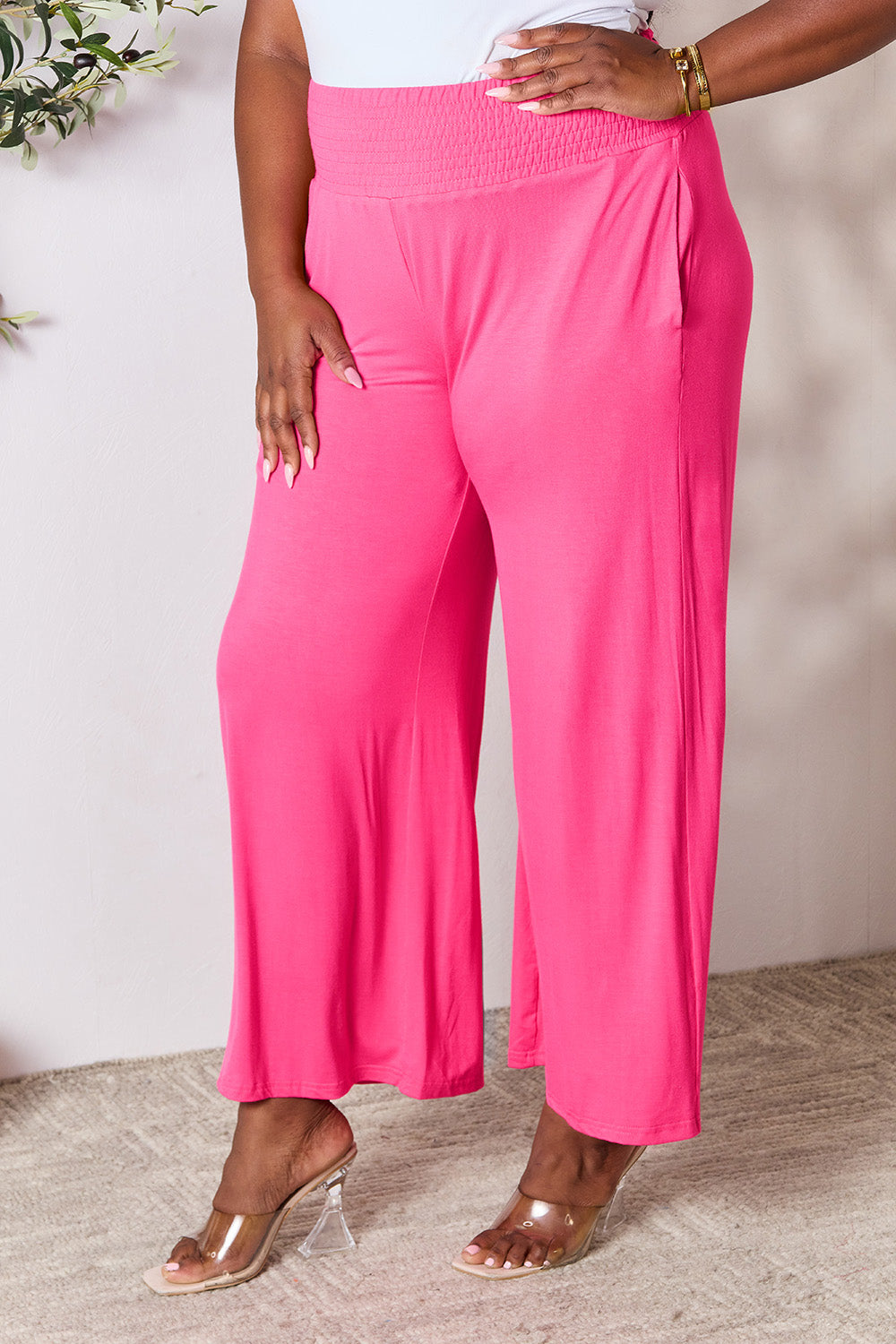 Smocked wide waistband wide leg pants, opaque.
