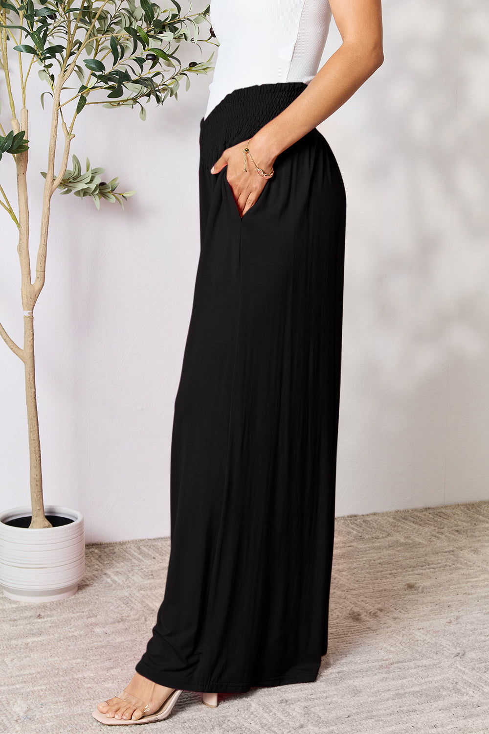 Smocked wide waistband wide leg pants, opaque.