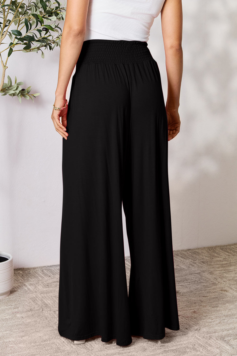Smocked wide waistband wide leg pants, opaque.