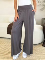 Smocked wide waistband wide leg pants, opaque.