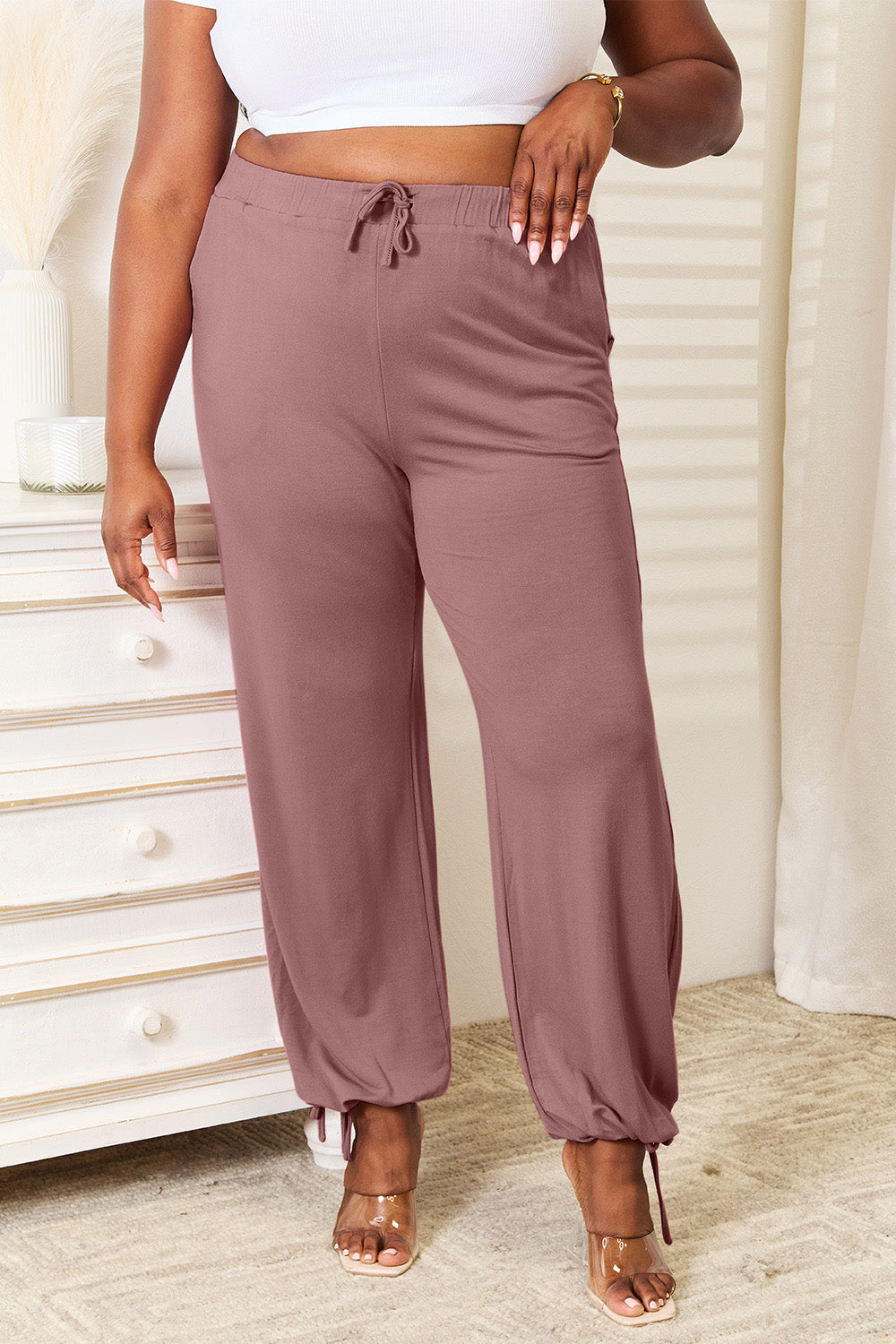 Soft rayon drawstring waist pants with pockets, opaque.