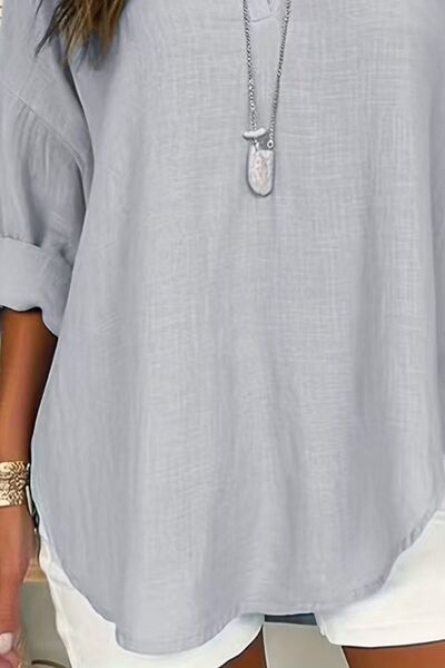 Solid Color Notched Long Sleeve Blouse.