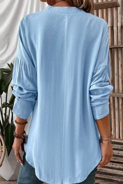 Solid Color Notched Long Sleeve Blouse.