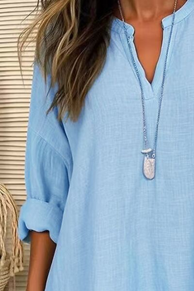 Solid Color Notched Long Sleeve Blouse.