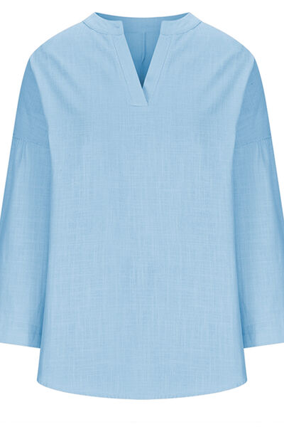 Solid Color Notched Long Sleeve Blouse.