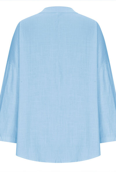 Solid Color Notched Long Sleeve Blouse.