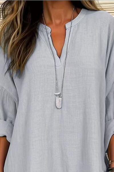 Solid Color Notched Long Sleeve Blouse.