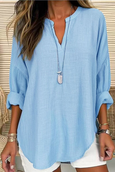 Solid Color Notched Long Sleeve Blouse.
