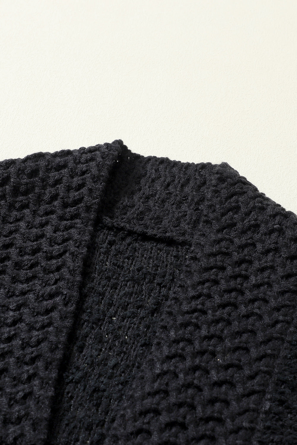 Solid color open front cardigan.