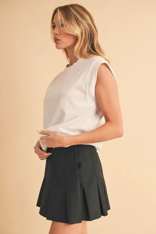 Solid color round neck tank, slightly stretchy.