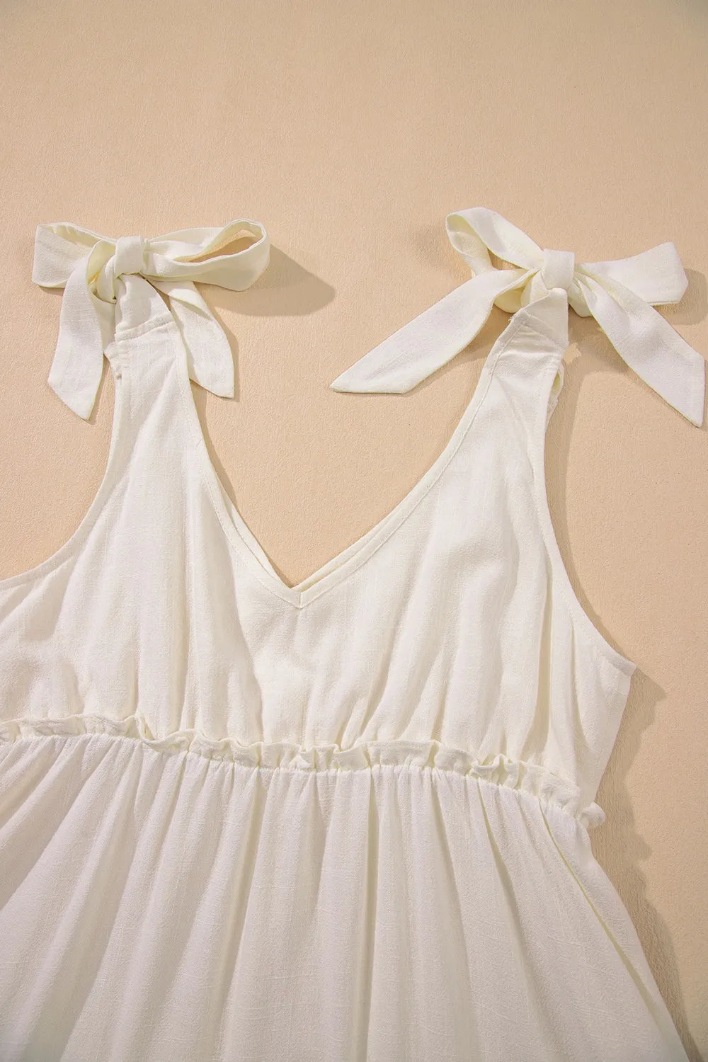 Solid Color Tied Straps Ruffle Tiered Mini Dress.