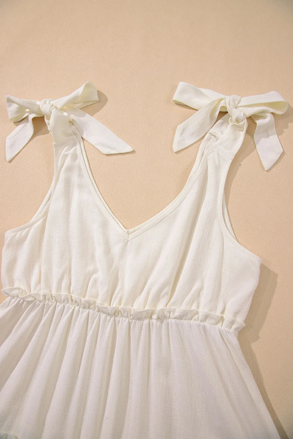 Solid Color Tied Straps Ruffle Tiered Mini Dress.