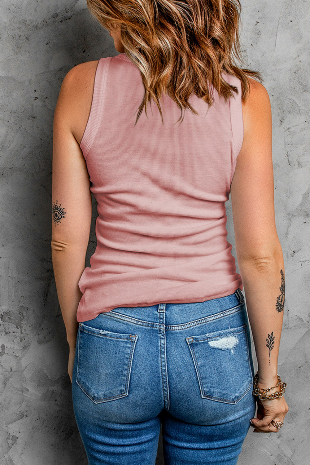 Solid round neck tank, opaque and slightly stretchy.