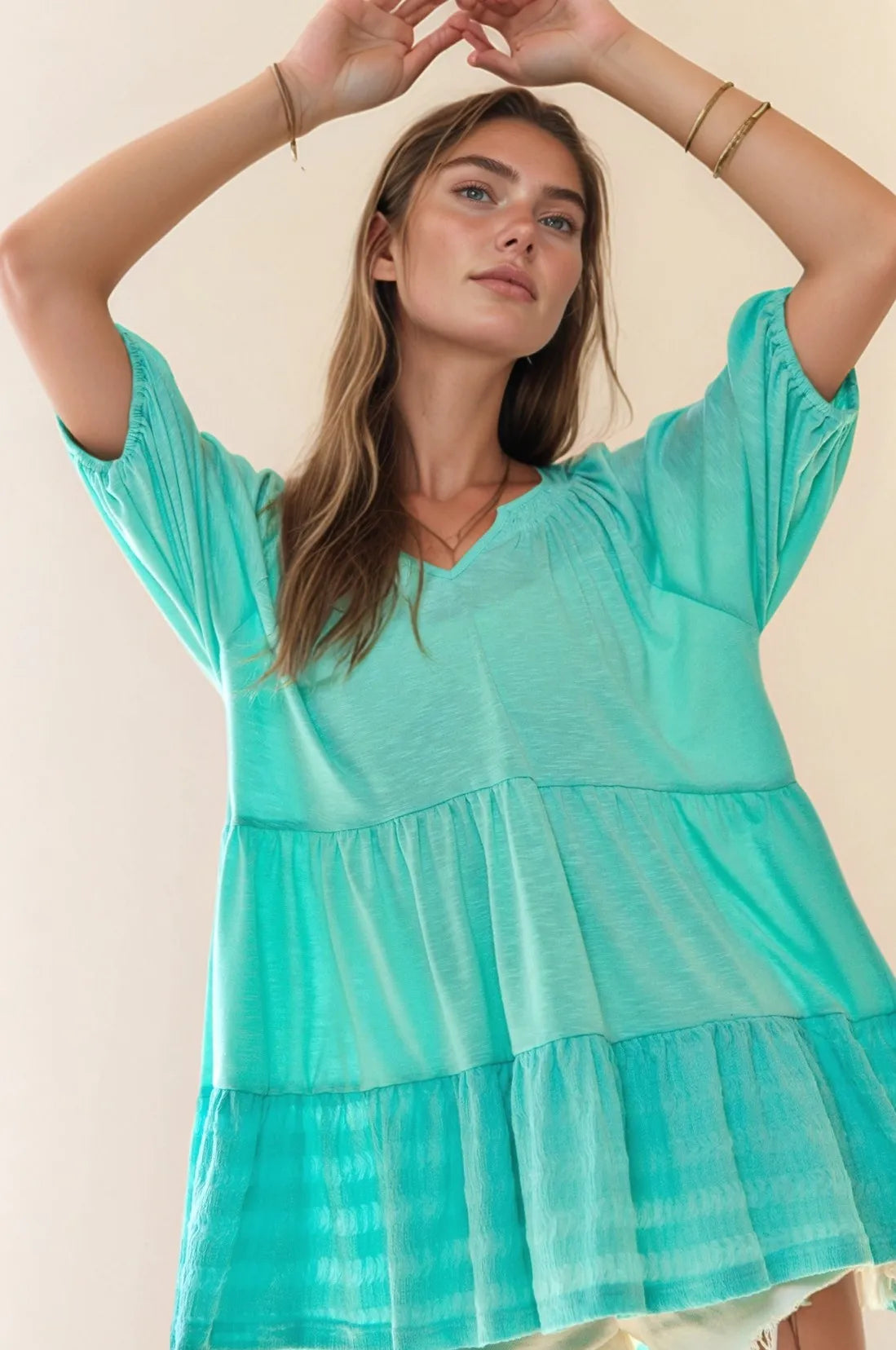 Davi Dani Solid Ruffled Flared Short Sleeve V Neck Top.
