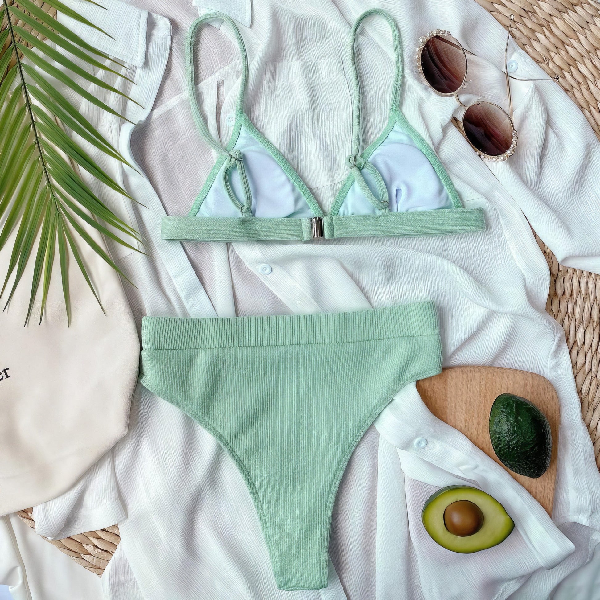 Solid ribbed spaghetti strap bikini set with mid-waist bottoms.
