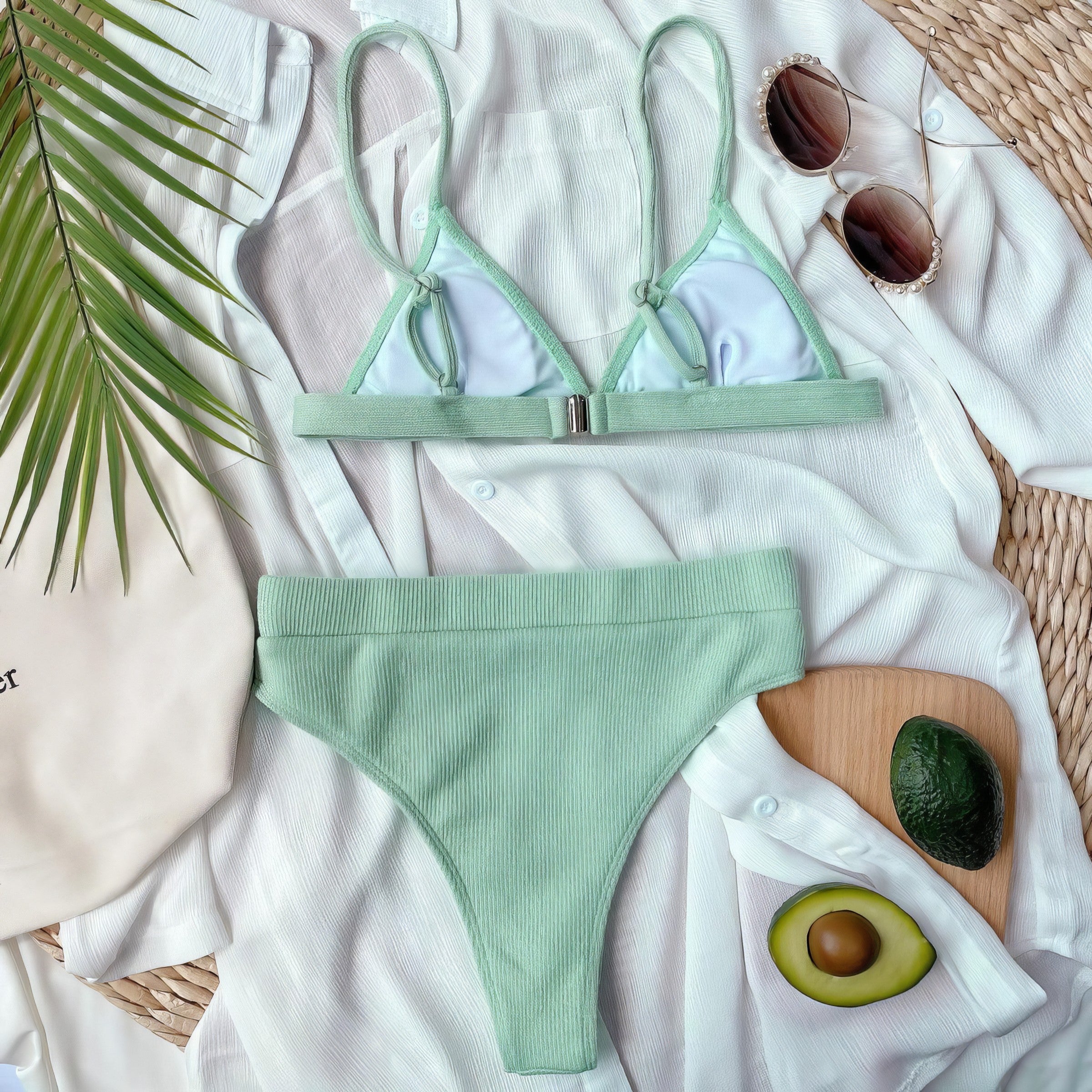 Solid ribbed spaghetti strap bikini set with mid-waist bottoms.