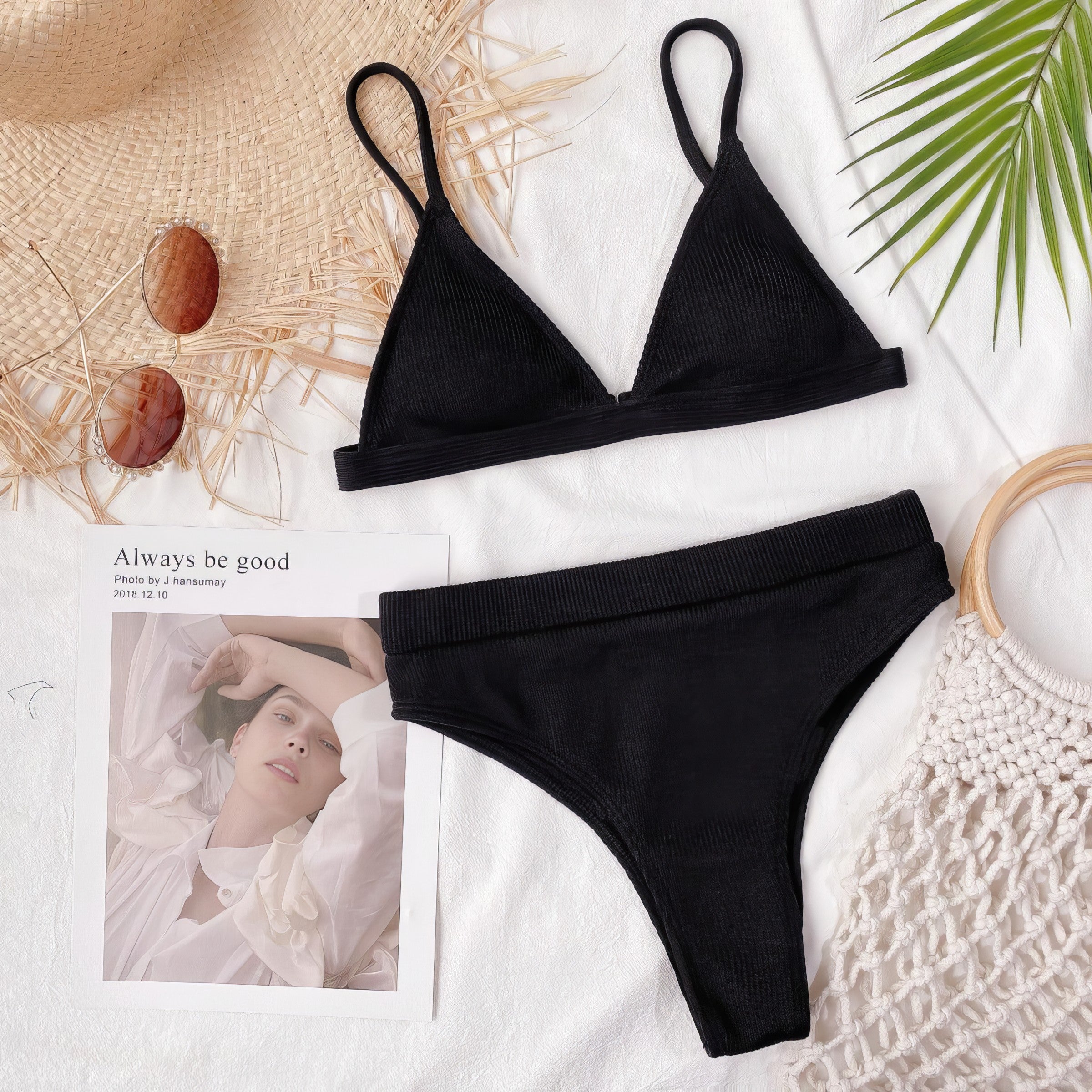Solid ribbed spaghetti strap bikini set with mid-waist bottoms.