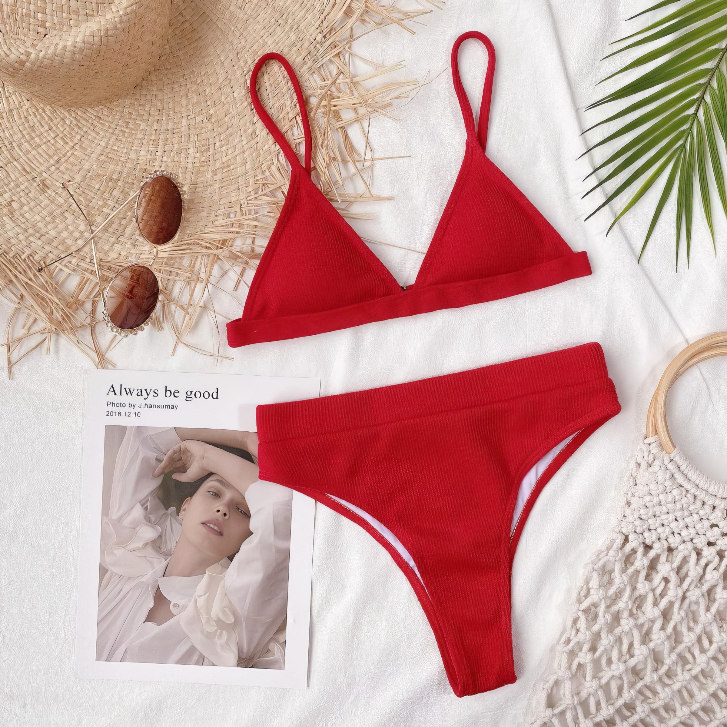 Solid ribbed spaghetti strap bikini set with mid-waist bottoms.
