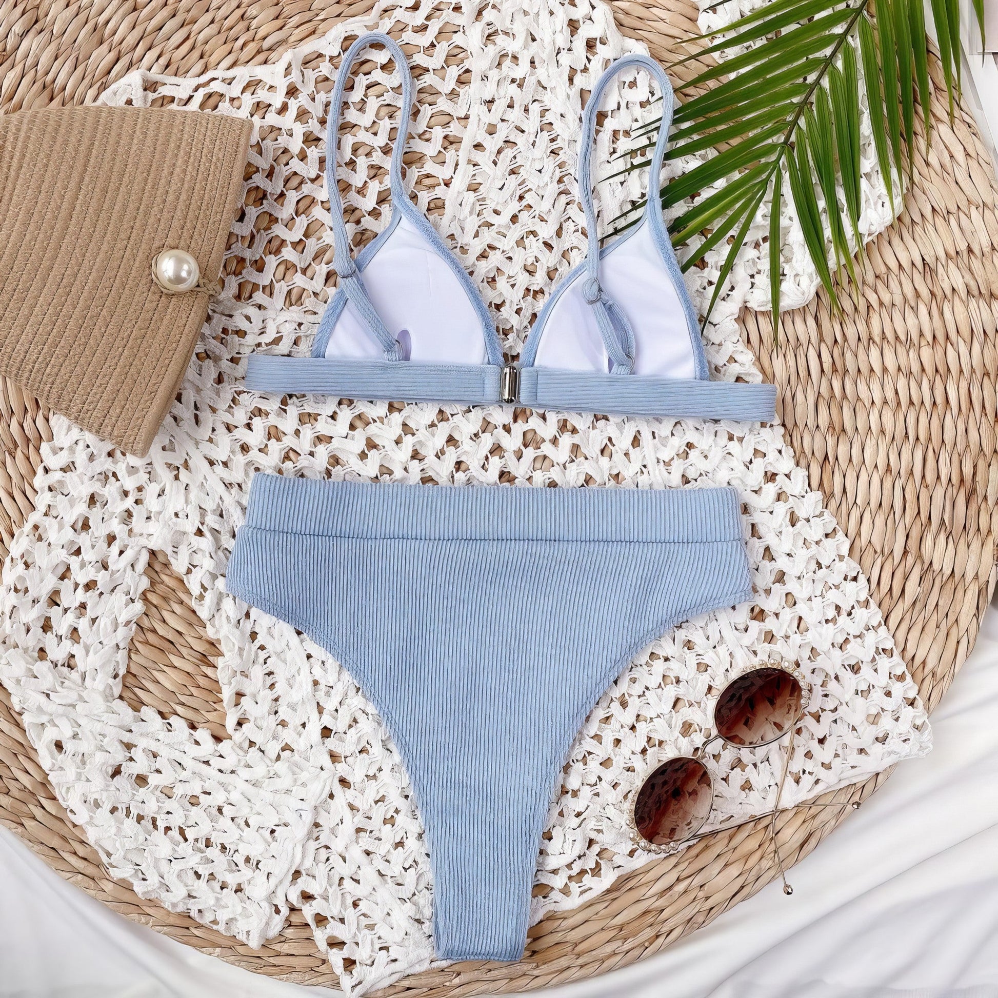 Solid ribbed spaghetti strap bikini set with mid-waist bottoms.